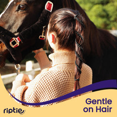 Rip Tie midnight securing a high ponytail for a neat long-hair hold