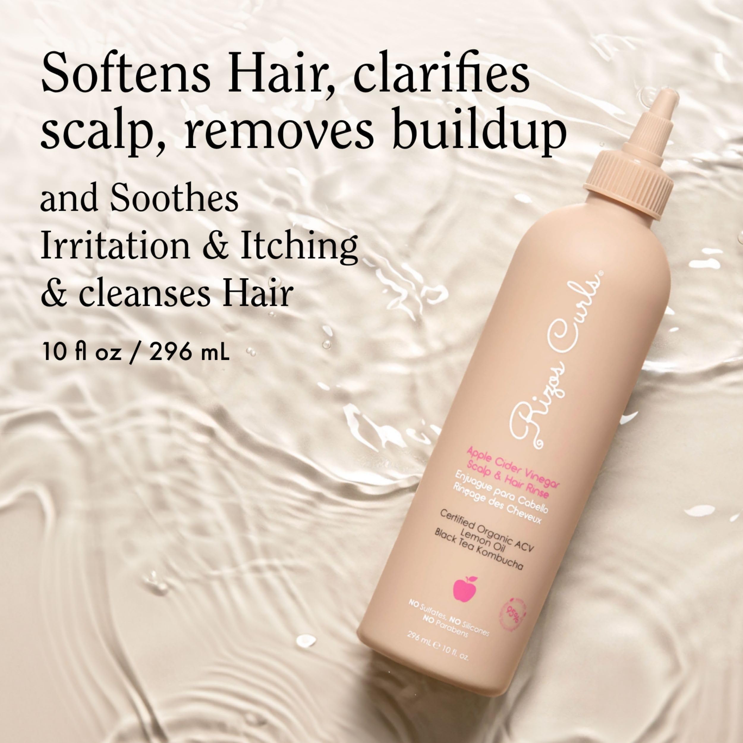 Close-up of Rizos Curls label highlighting apple cider vinegar, kombucha, and niacinamide benefits