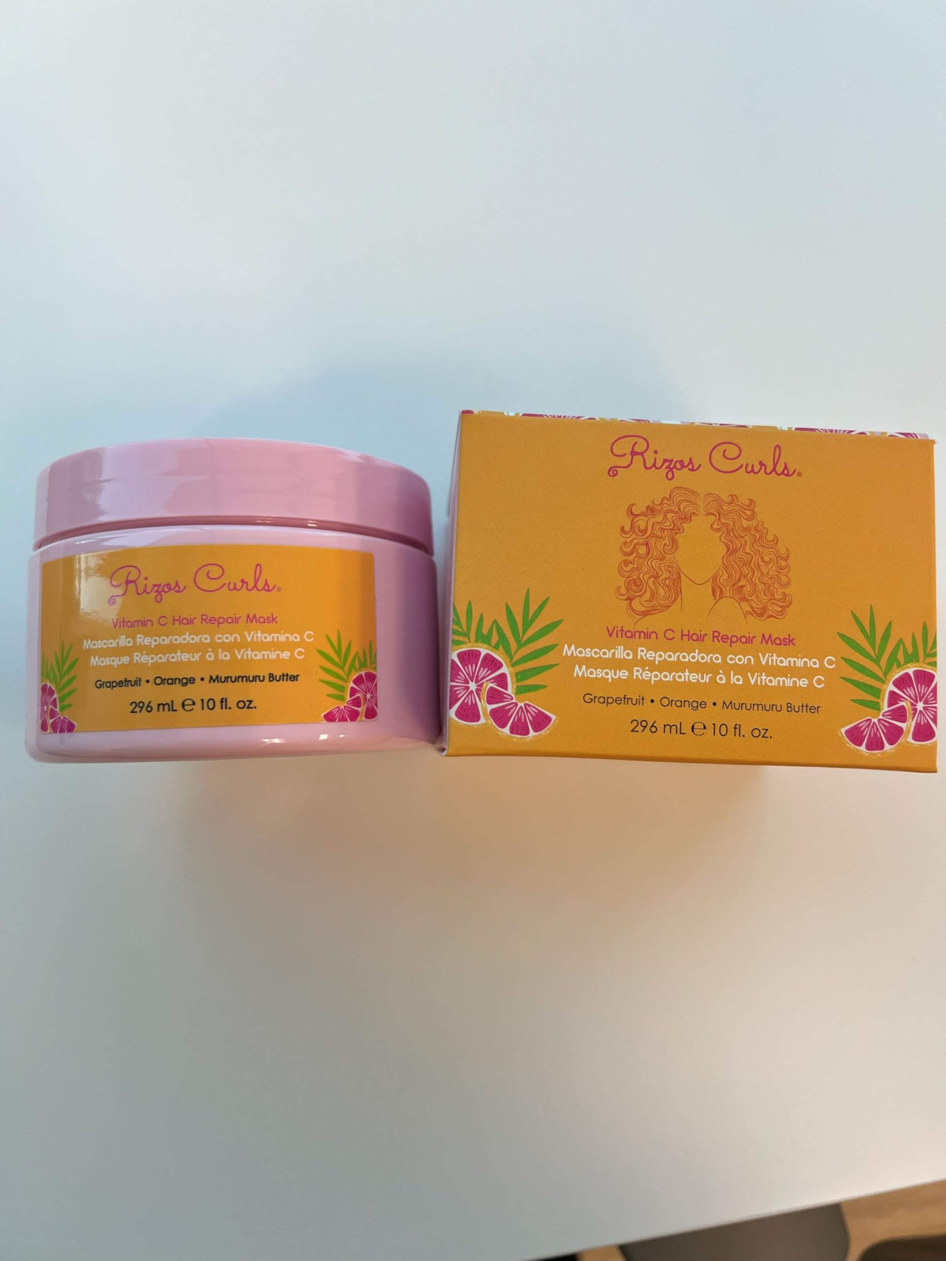 Rizos Curls on bathroom shelf lifestyle scene promoting daily routine benefit