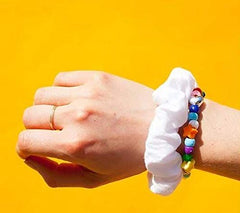 RJMBMUP scrunchies packed in travel pouch for on-the-go styling