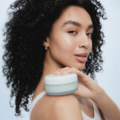 RMS Beauty balm in palm demonstrating easy application benefit