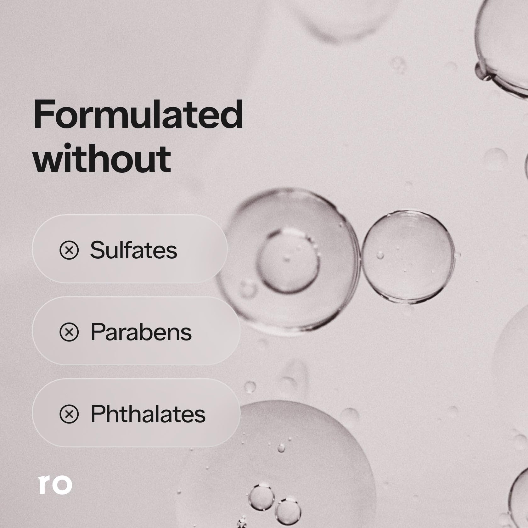 Close-up of Ro shampoo lather texture showing clarifying foam benefit