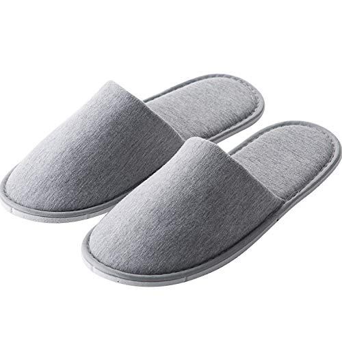 Rocutus slippers on feet in bedroom offering quick indoor comfort