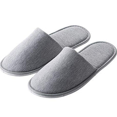 Rocutus slippers on feet in bedroom offering quick indoor comfort