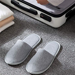 Rocutus slippers beside ruler for size and scale clarity
