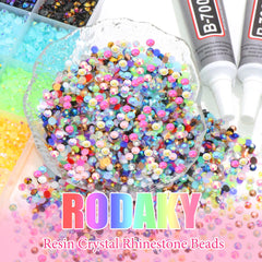 RODAKY next to a ruler showing 3mm rhinestone scale for accurate size reference