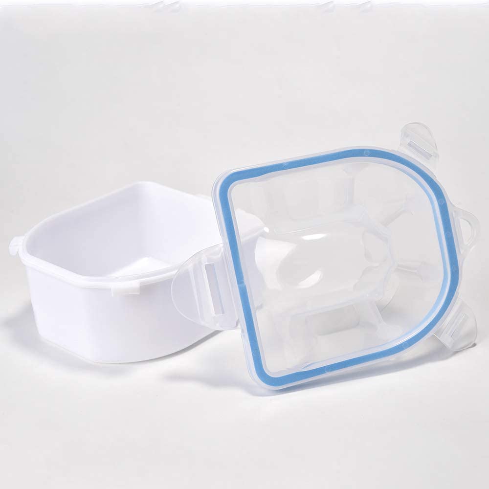 Rolabling bowls beside a credit card for size comparison showing portable manicure sizing