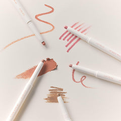 rom&nd pencil beside coin showing compact size and easy portability benefit