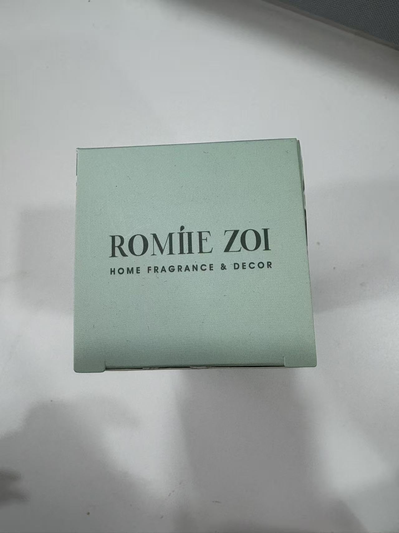 ROMIIE ZOI size comparison with everyday items showing 236 ml scale