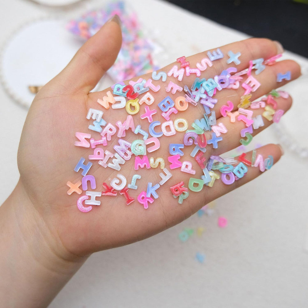 RONGFY close-up of resin letter texture highlighting glitter finish