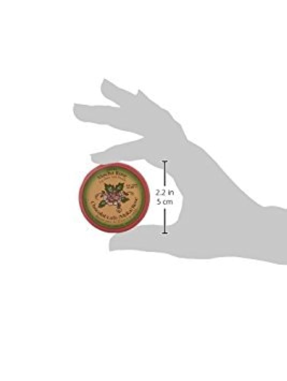 ROSEBUD SALVE tin in hand showing compact 0.8 oz scale and portability benefit