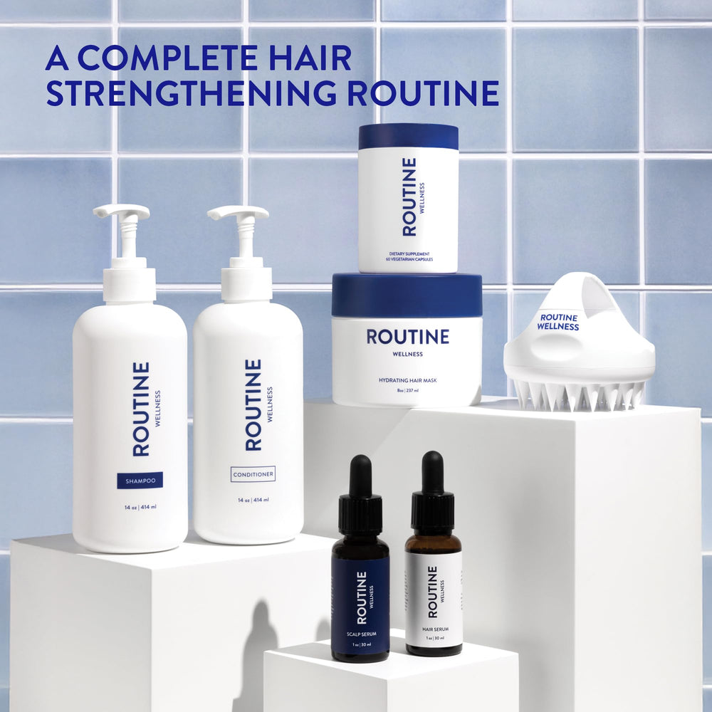 Routine Wellness in use: lathered hair under shower demonstrating fuller-looking results