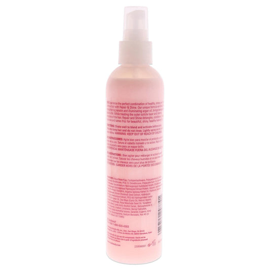 Roux leave‑in treatment applied to damp hair for smoother results