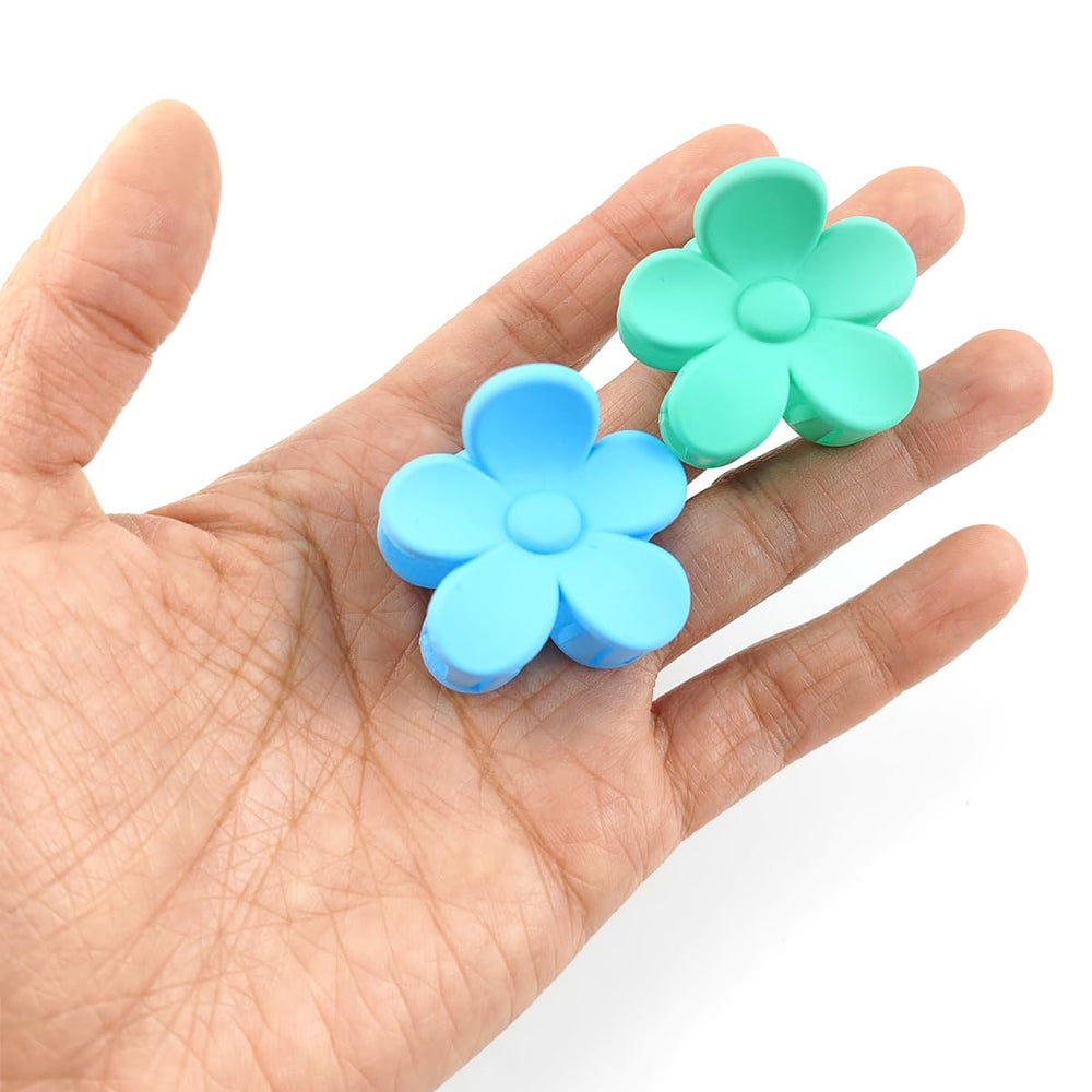 ROYHOO flower claw clip holding hair in a half-up style for hands-free convenience