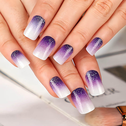 RTKHFZE close-up of glitter French tip detail highlighting shimmer and precise pattern benefit