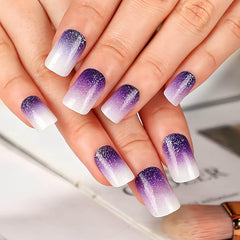 RTKHFZE close-up of glitter French tip detail highlighting shimmer and precise pattern benefit
