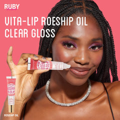 Ruby Kisses gloss on model lips for hydrated natural-looking shine
