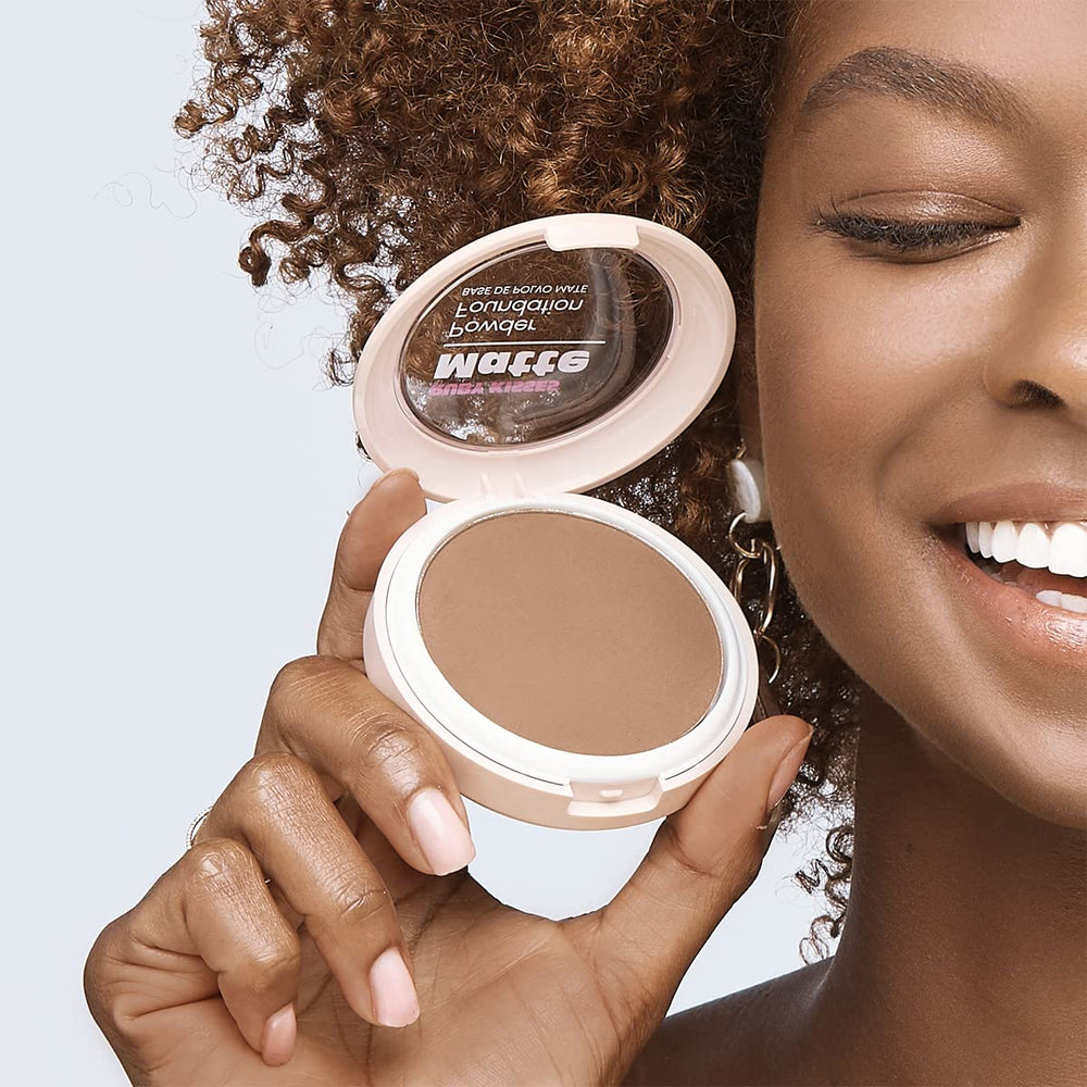 Ruby Kisses compact applied with brush highlighting natural matte result