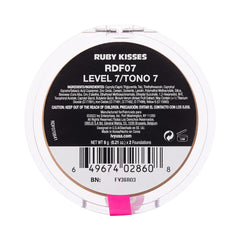 Ruby Kisses jar in hand showing product size and travel-friendly benefit
