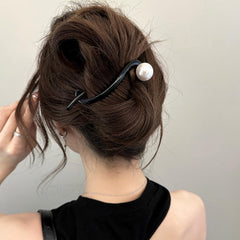 RUIYDZ clipped into long straight hair demonstrating neat updo hold