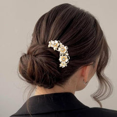 RUIYDZ pearl flower in bun demonstrating styling use and elegant accent benefit