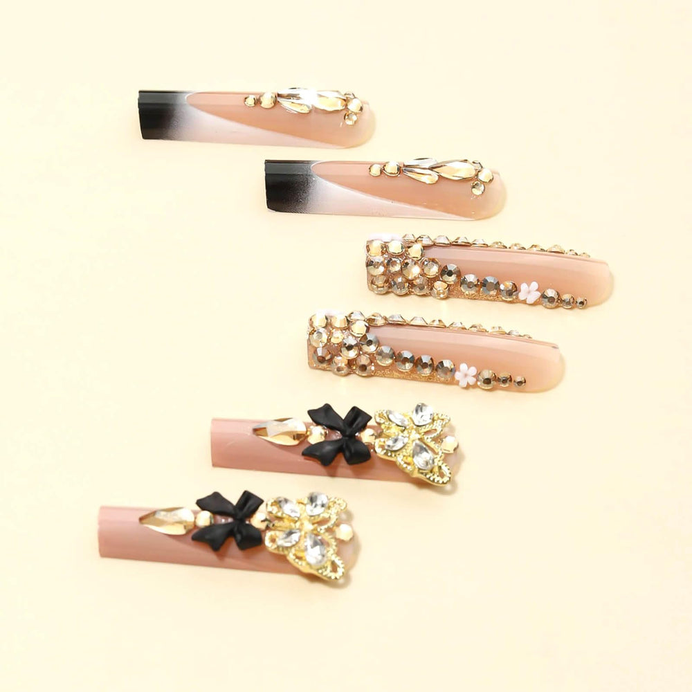 RUOKEXIN close-up of gold 3D butterfly and bow detail, shows luxury finish
