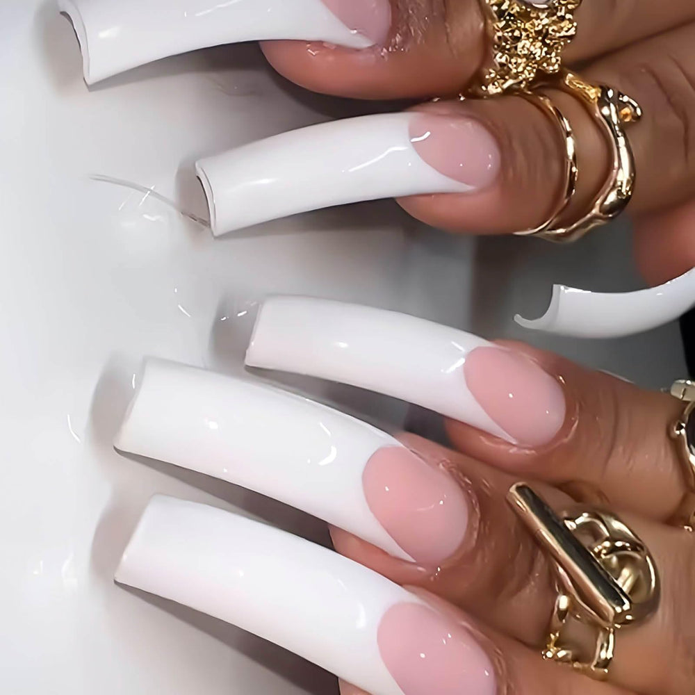 RUOKEXIN close-up of white French tip design highlighting clean glossy edges and detail