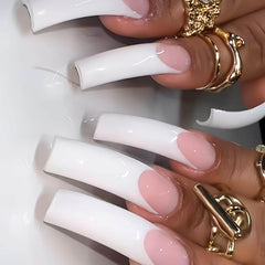 RUOKEXIN close-up of white French tip design highlighting clean glossy edges and detail