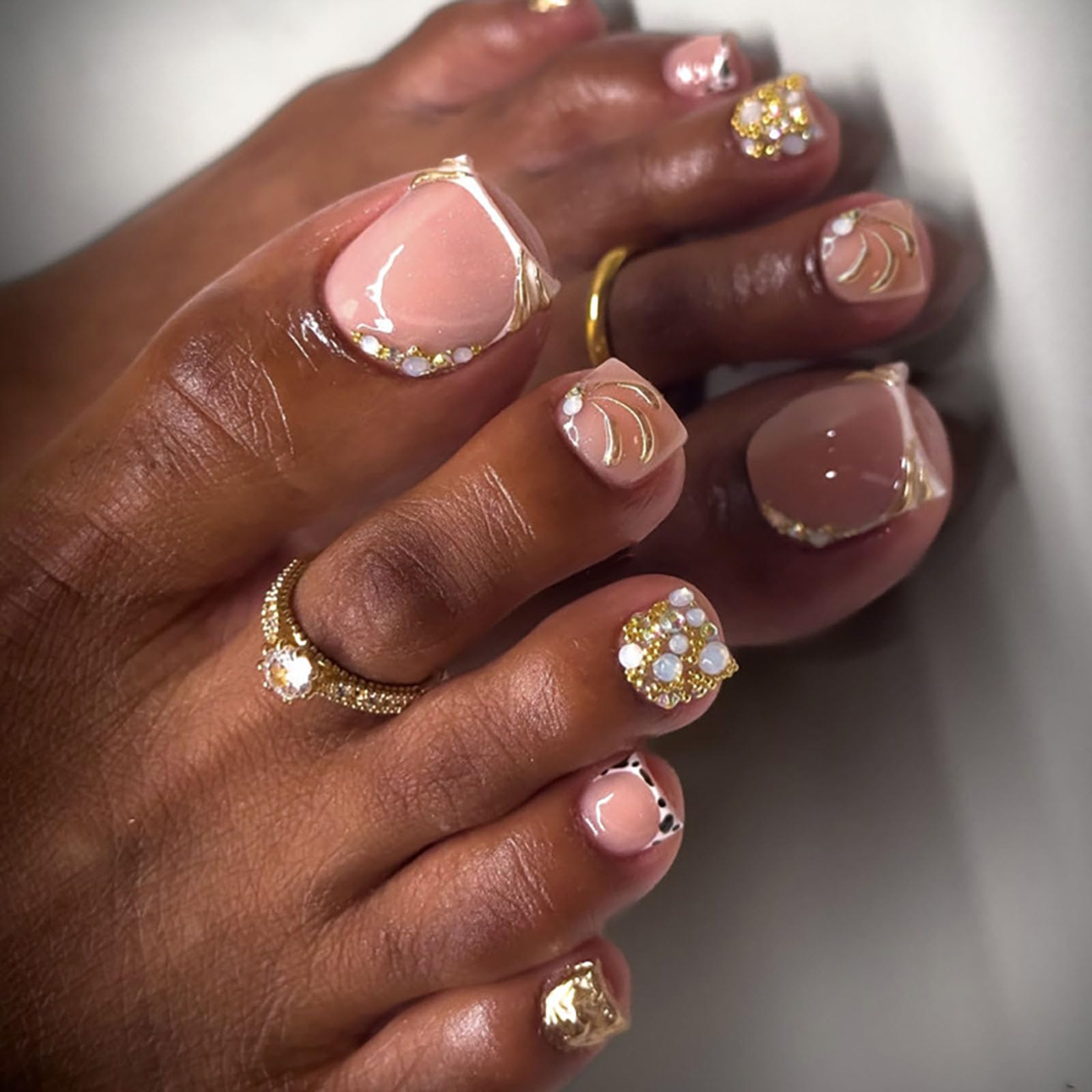 RUOKEXIN front packaging showing French tip and gold rhinestones, stylish finish