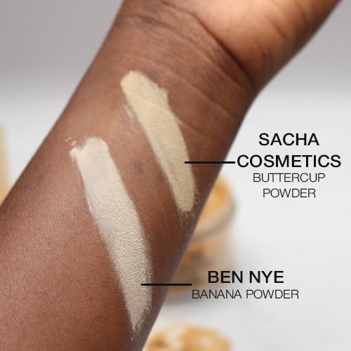 Sacha Cosmetics jar next to coin to show 1.75 oz scale and travel-friendly size benefit