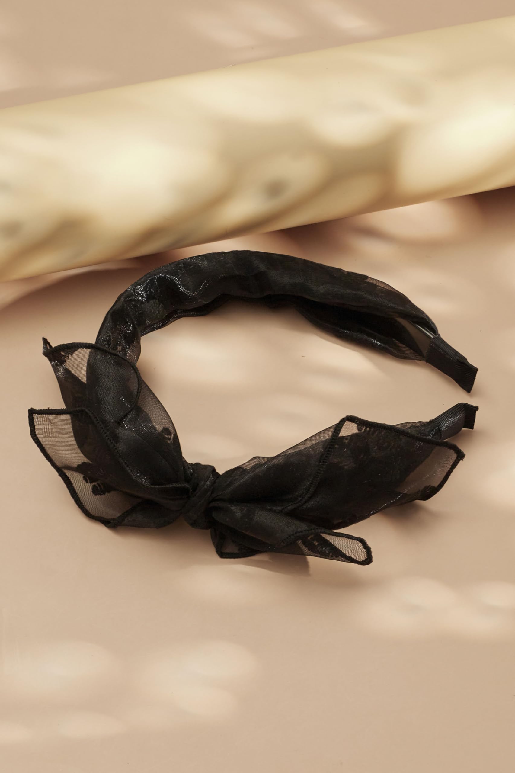 Sacina styled with streetwear outfit showing versatile gothic accessory appeal