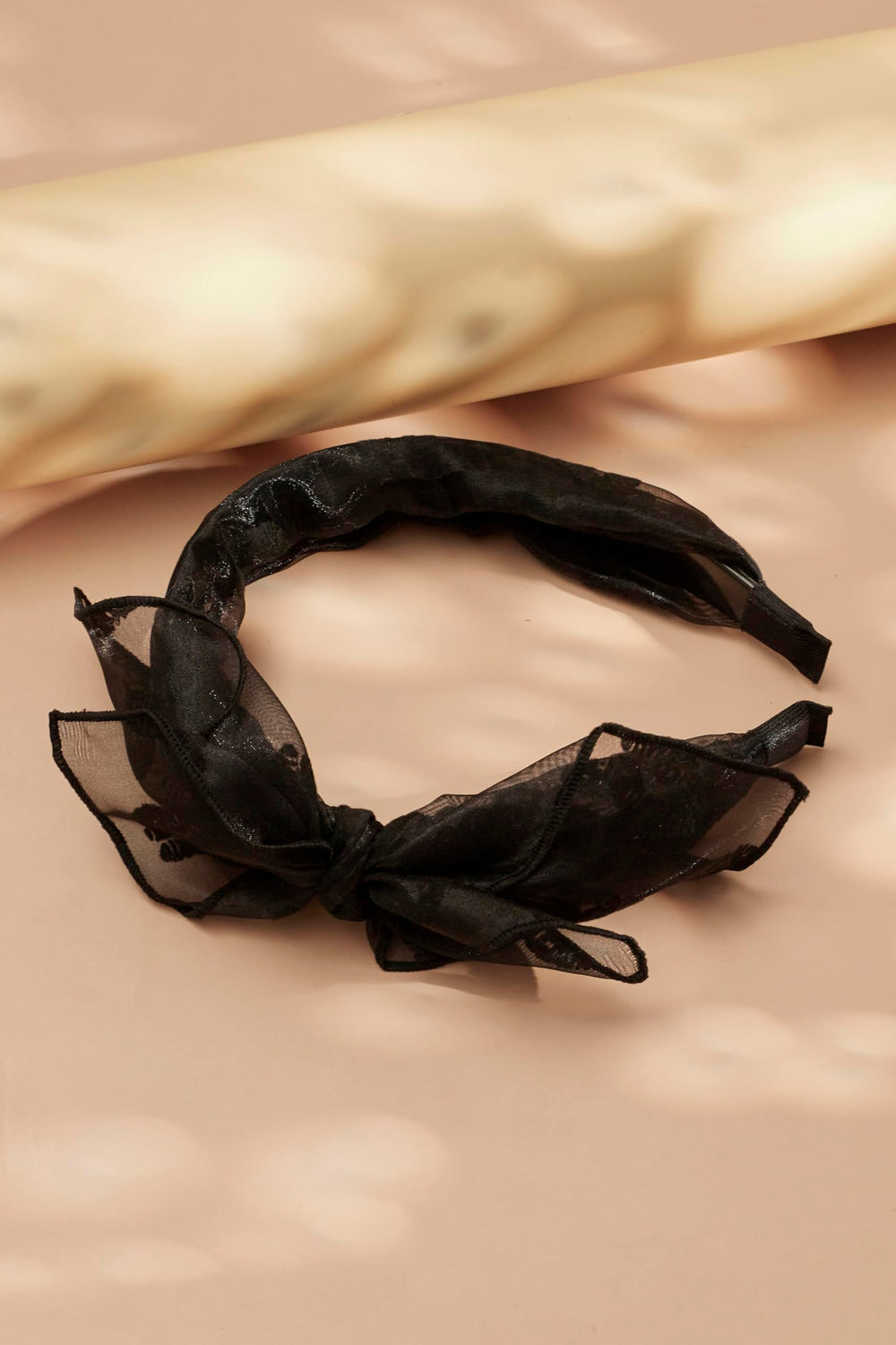 Sacina styled with streetwear outfit showing versatile gothic accessory appeal