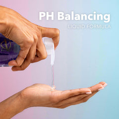 Hand next to Safeguard bottle demonstrating 15.5 oz scale and convenient size