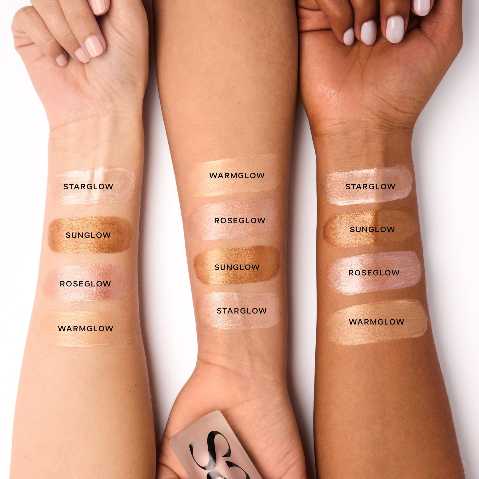 Saie swiped on skin showing dewy sheen and natural-looking luminosity benefit