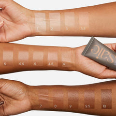 Saie Slip Tint blended with fingertips showing effortless application