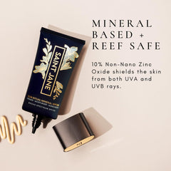 SAINT JANE product in hand to show 1.7 oz scale and travel-friendly size