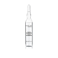 SALERM Vitaminado hand applying drops to hair ends for soft, protected strands