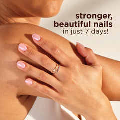 Product label detail with ingredients list emphasizing biotin and argan oil benefit