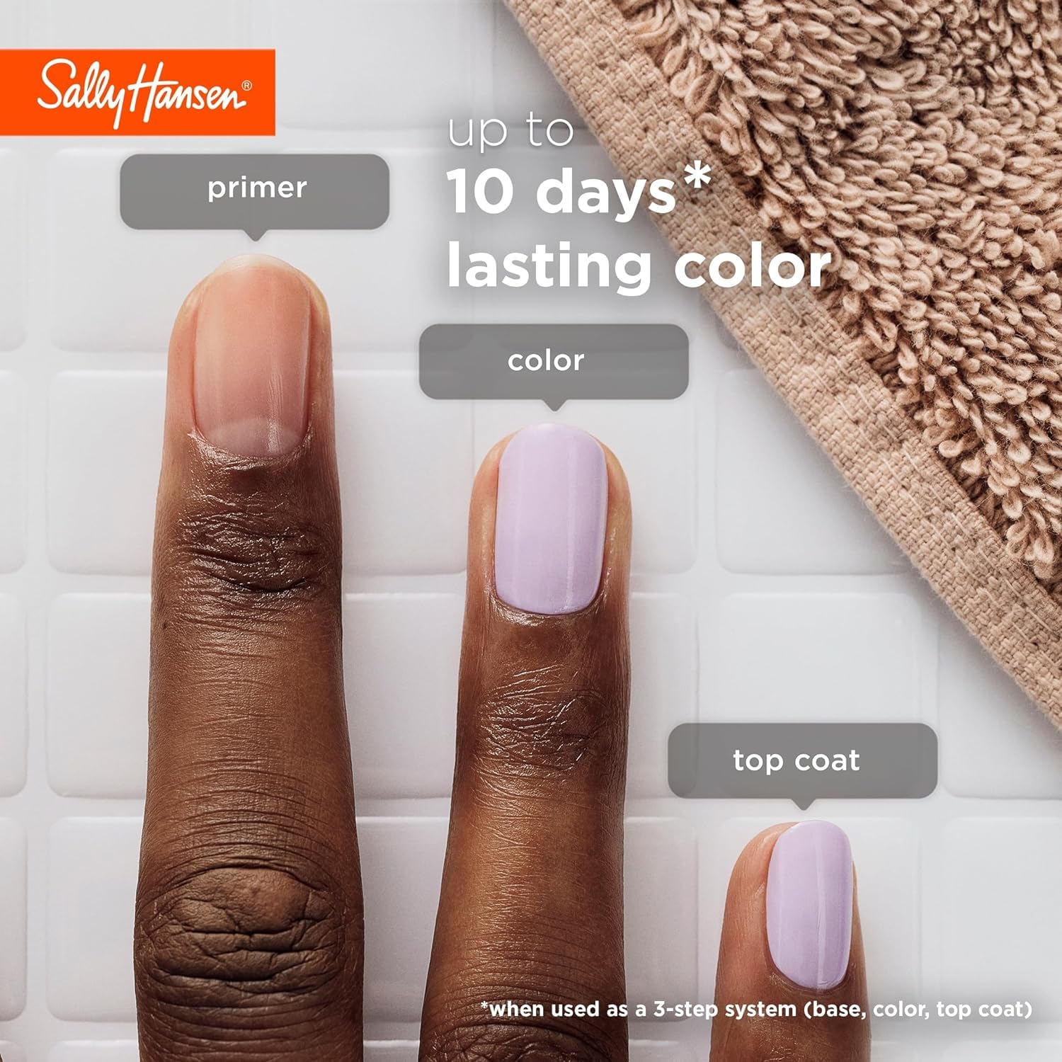 Hand applying Sally Hansen Color Grip primer for longer-lasting polish