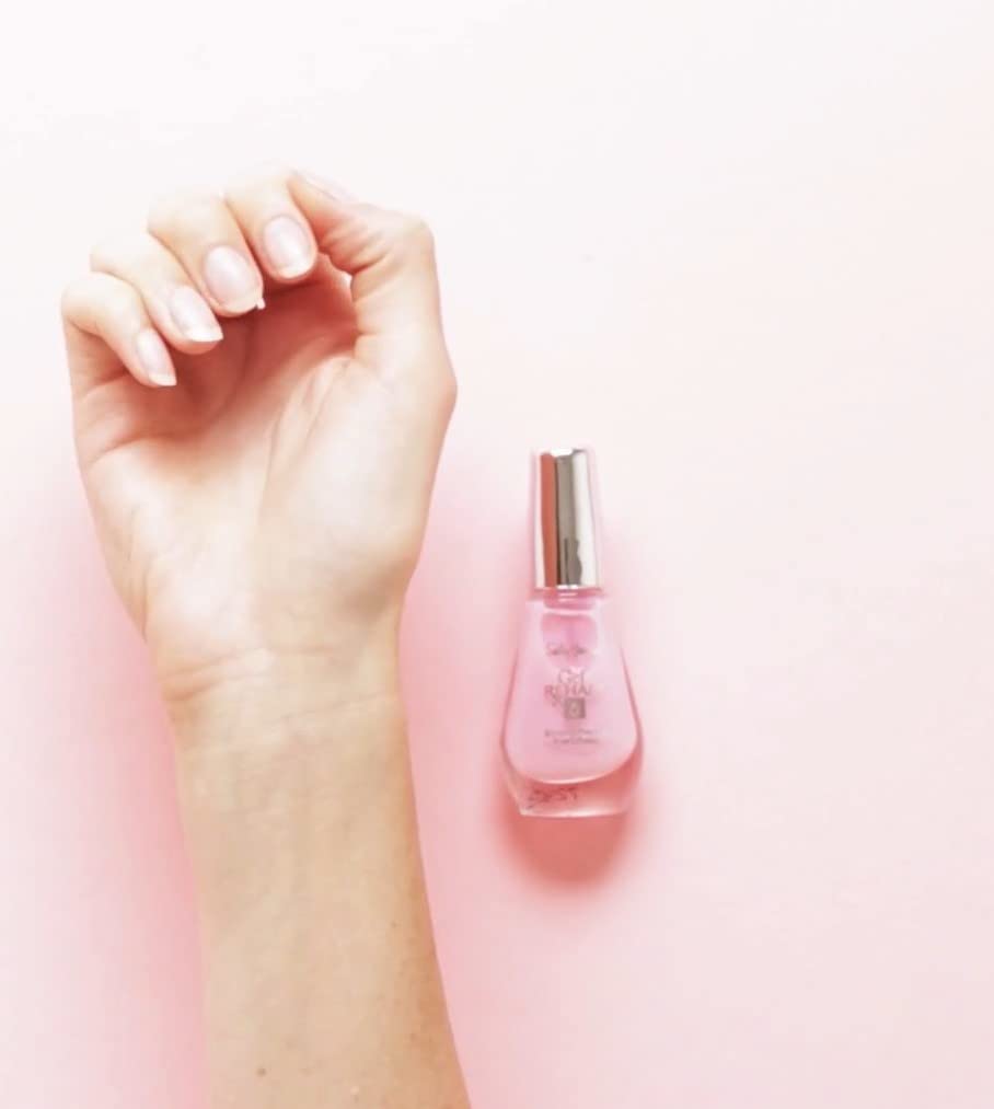 Application on a nail being painted with Sally Hansen for quick repair
