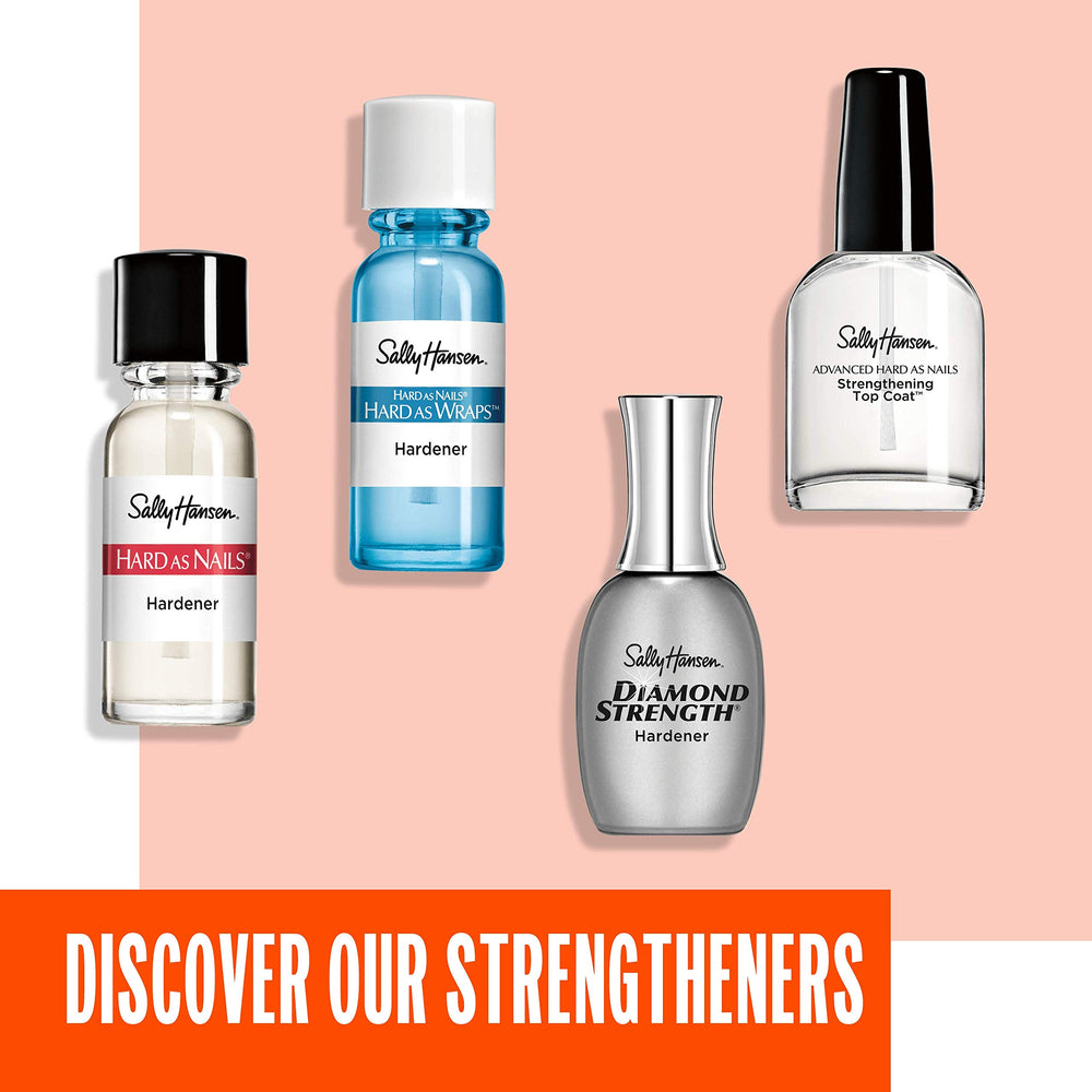Jasmine petals rose buds and vitamin E oil beside Sally Hansen bottle