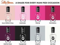 Sally Hansen bottle next to ruler showing compact travel-friendly size