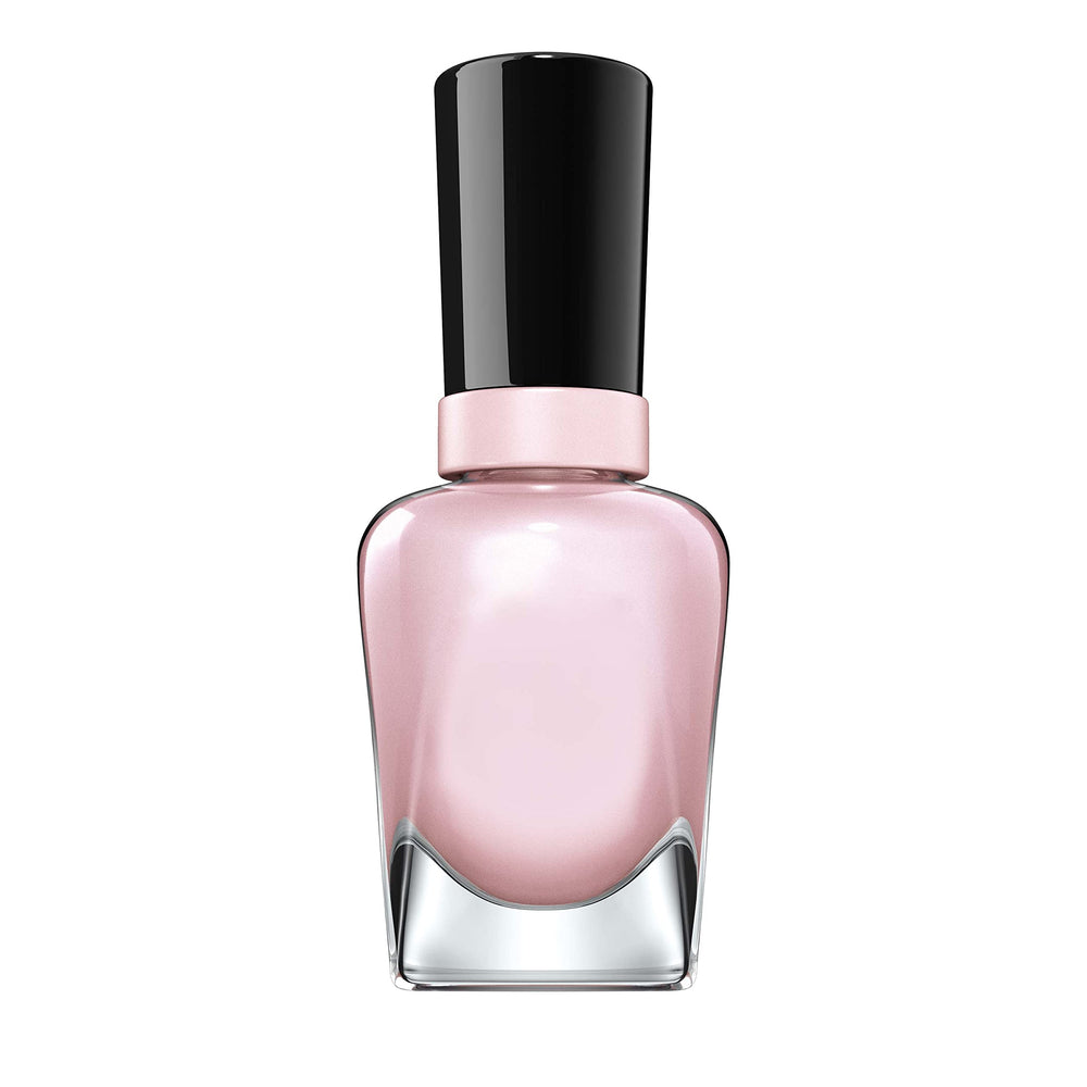 Sally Hansen bottle next to a coin for scale, conveys true product size benefit
