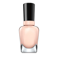 Sally Hansen on desk with manicure tools showing easy at-home use