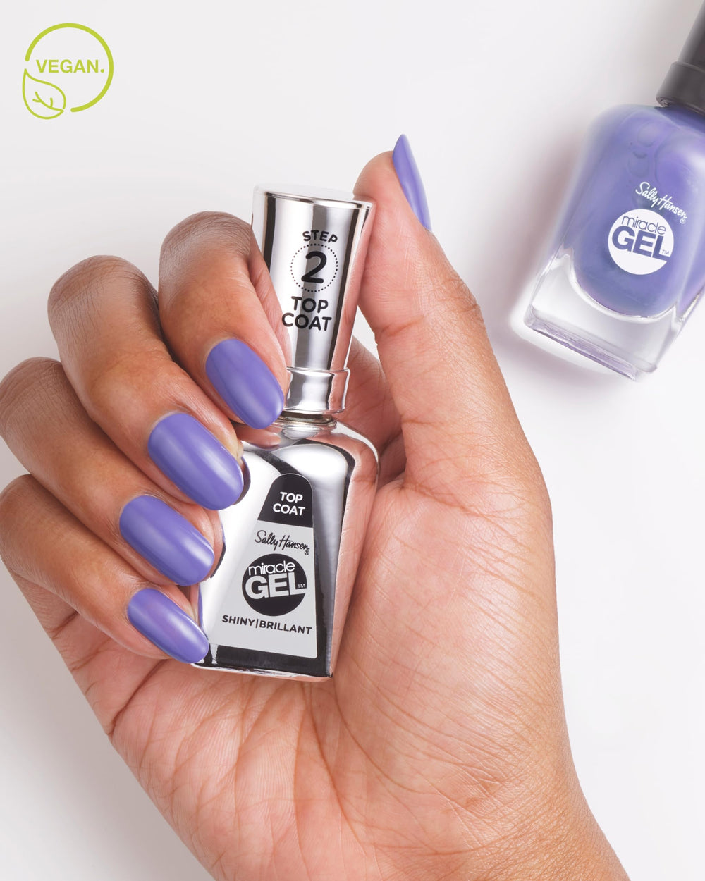 Sally Hansen shiny topcoat swatch on nail showing high-gloss protective layer