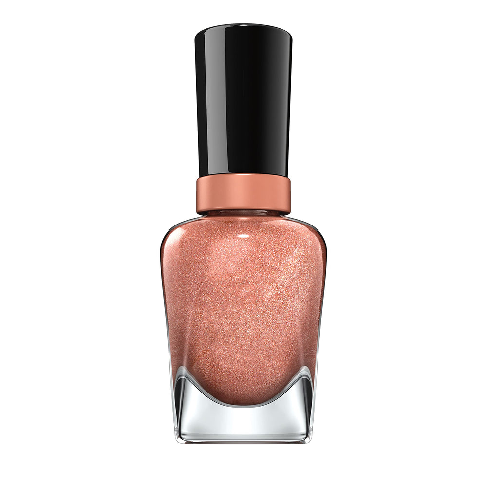 Sally Hansen Terra-Coppa manicure on tabletop lifestyle scene showing wearable color