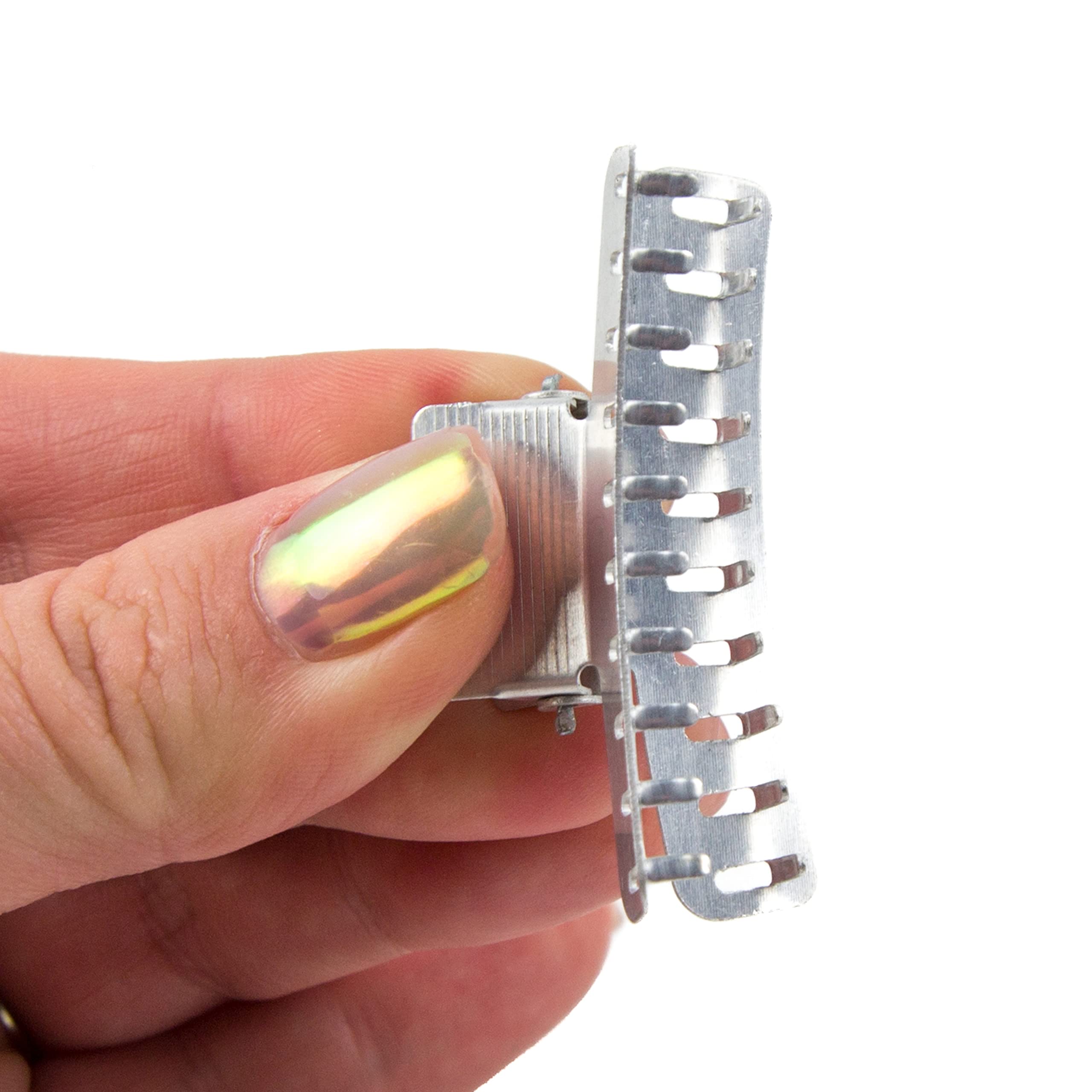 Salon Supply Co clips securing finger waves on model for precise drying and hold