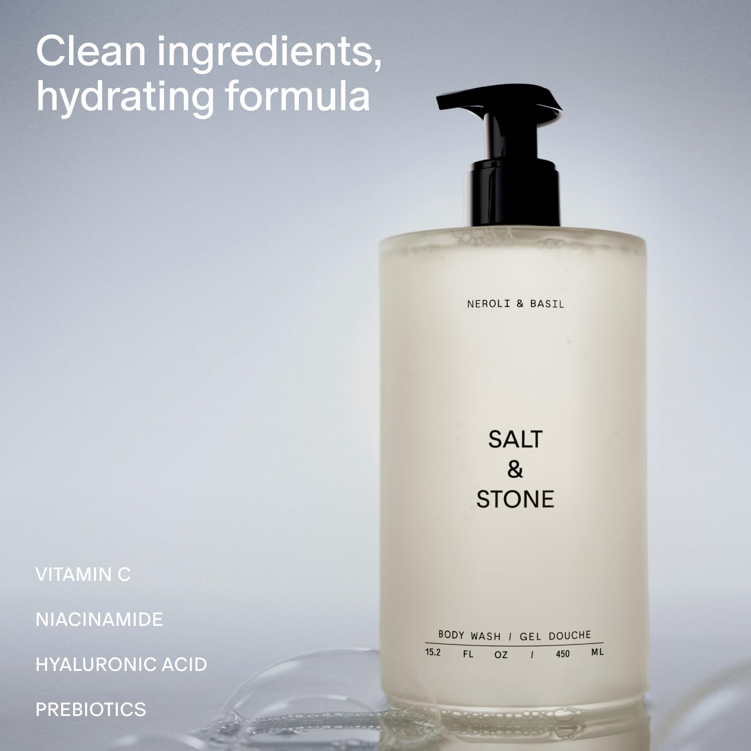 Salt & Stone pump bottle held in hand demonstrating easy dispensing