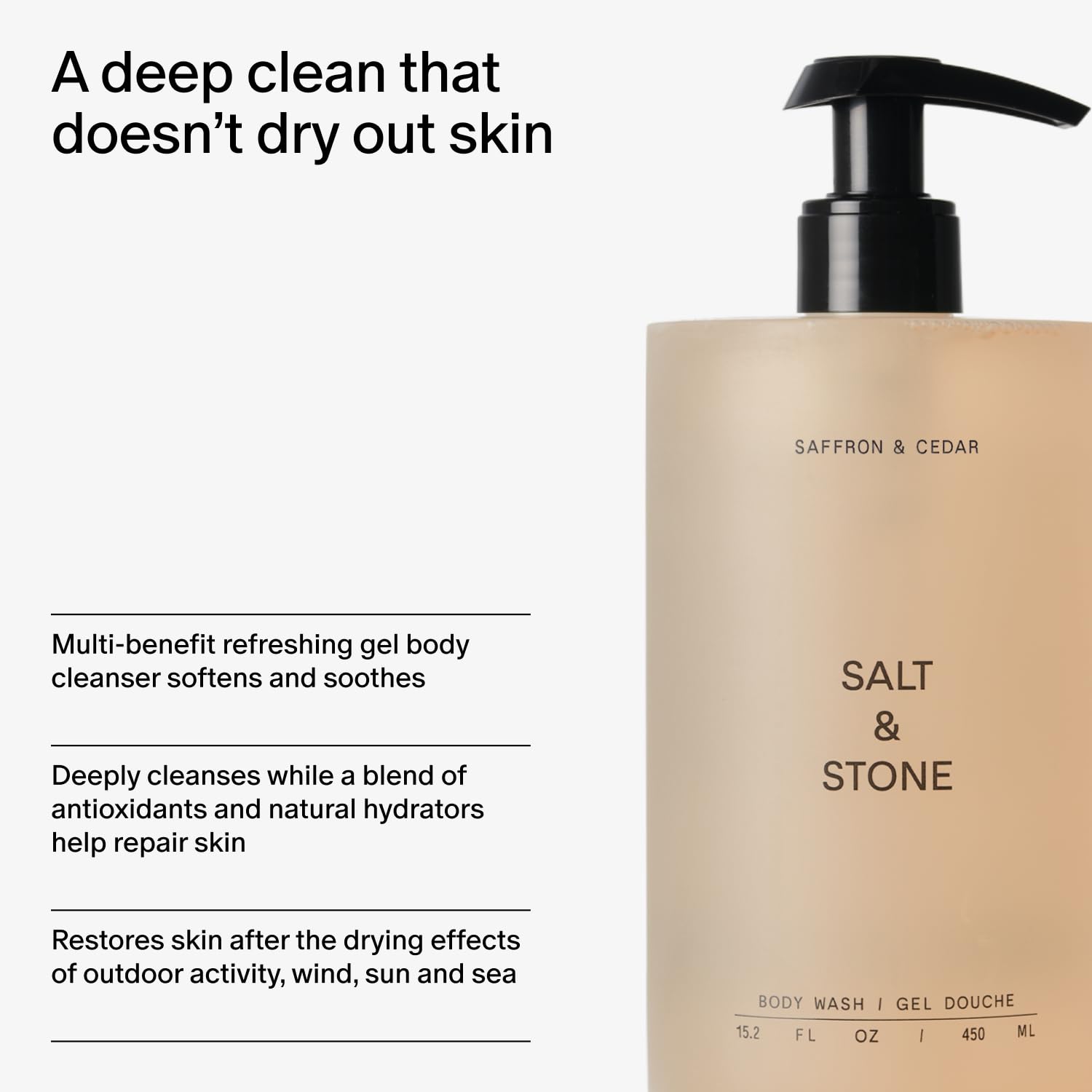 Salt & Stone bottle in hand for scale showing generous 15.2 fl oz volume