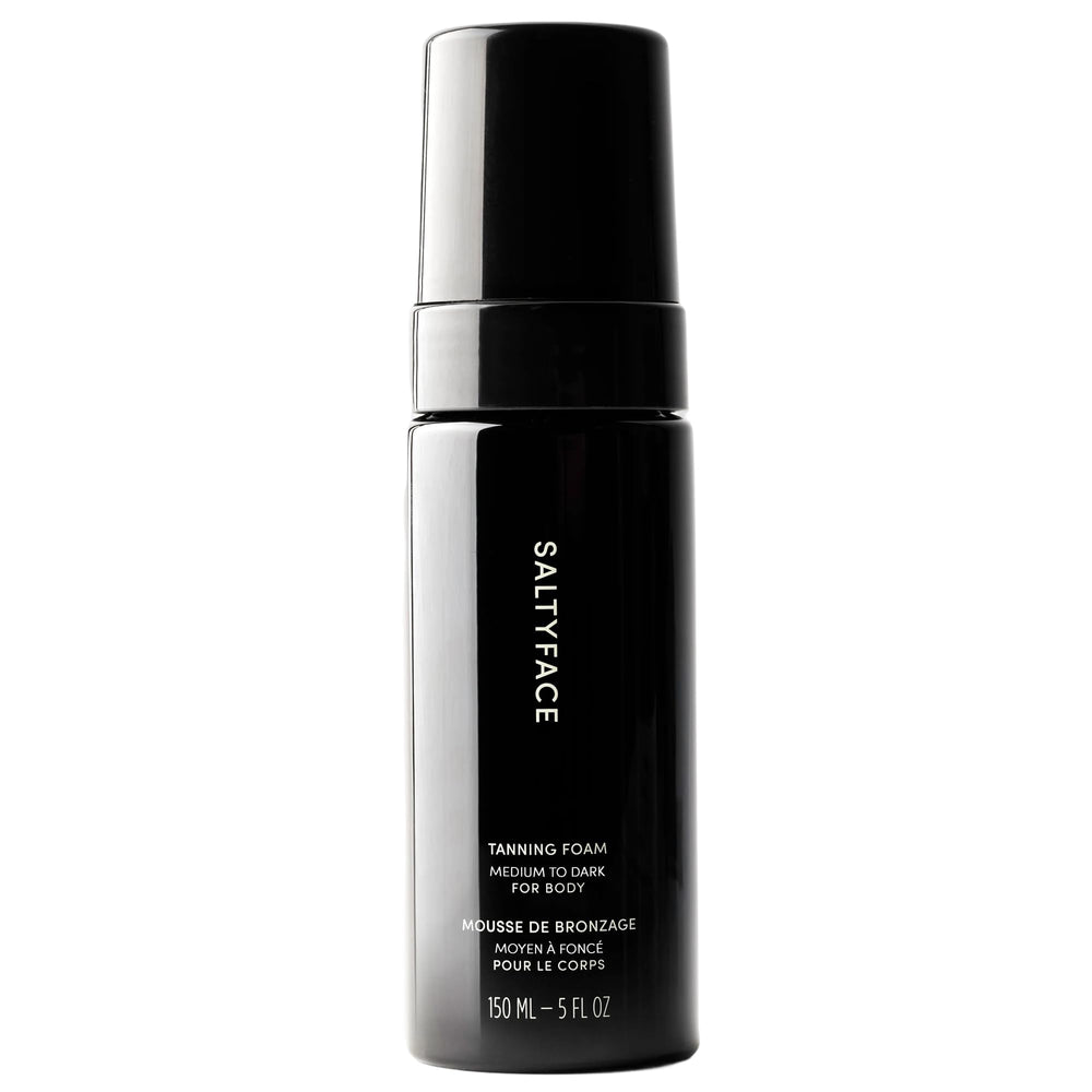 SALTYFACE compact pump bottle front showing clear foam and volume control benefit